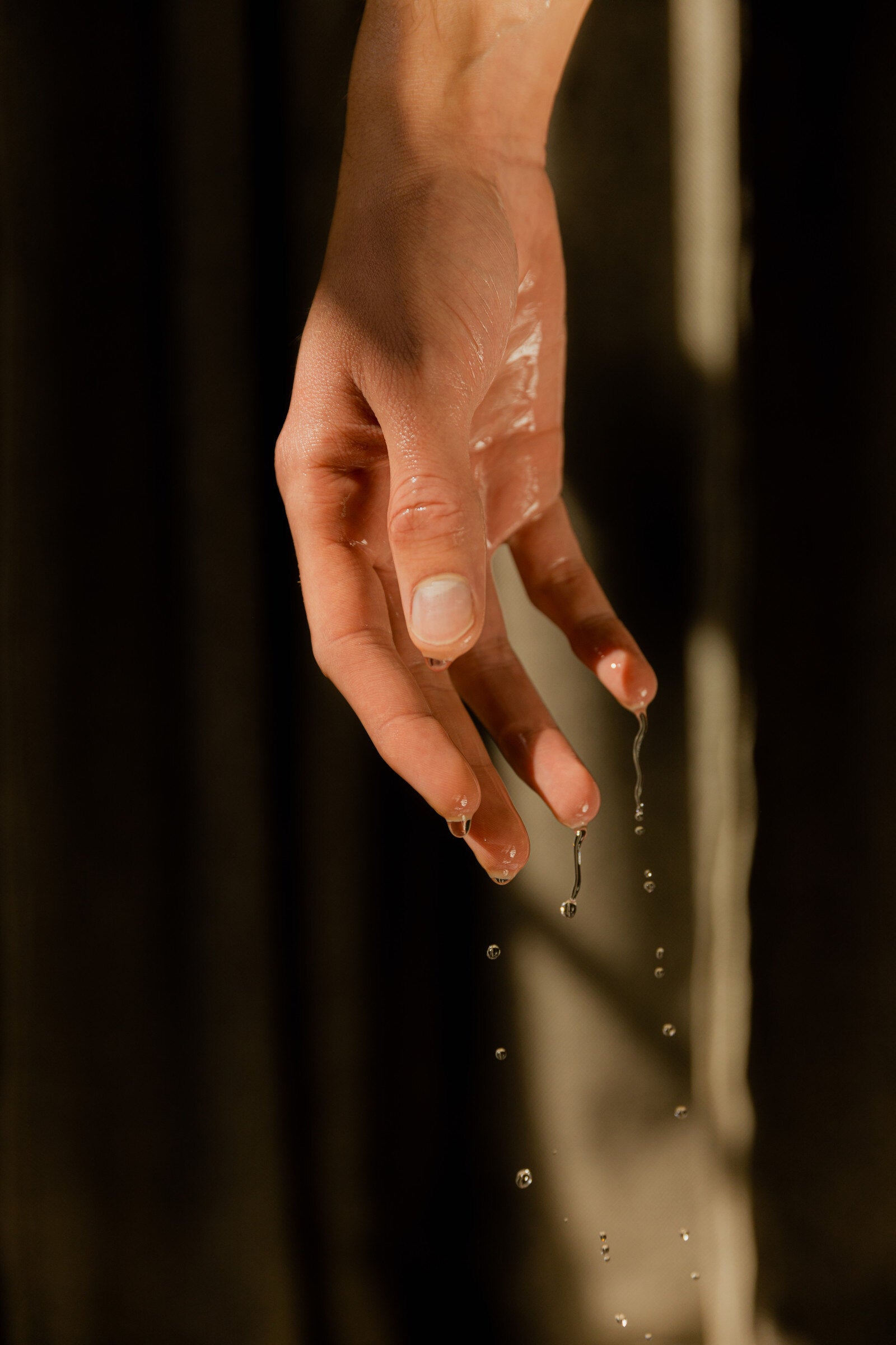 Water dripping from a hand